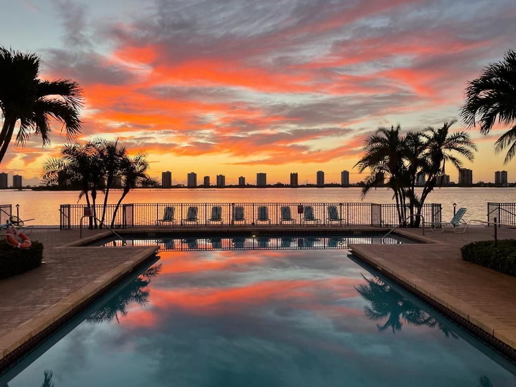 Photo of 1035 Lake Shore Drive #203, Lake Park, FL 33403 (MLS # R11015608)