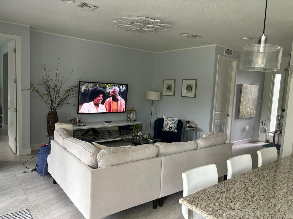 Photo of 11093 SW Carriage Hill Lane, Port St Lucie, FL 34987 (MLS # R11128797)