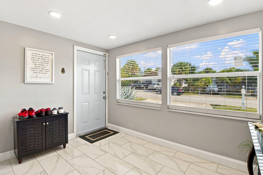 Photo of 1217 W 32nd Street, Riviera Beach, FL 33404 (MLS # B26068583)