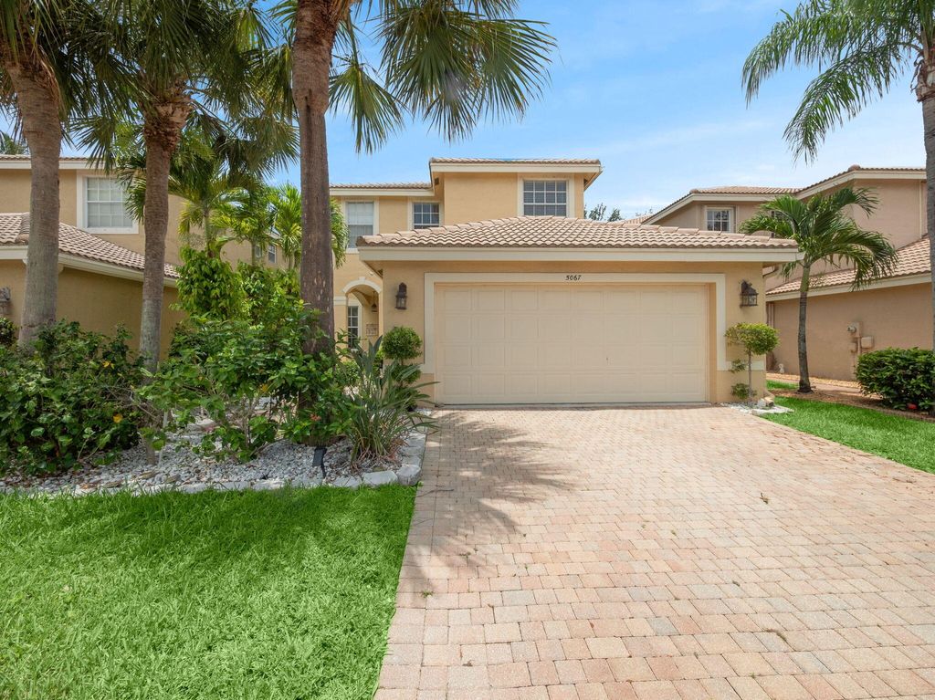 Photo of 5067 Starblaze Drive, Greenacres, FL 33463 (MLS # R11103046)