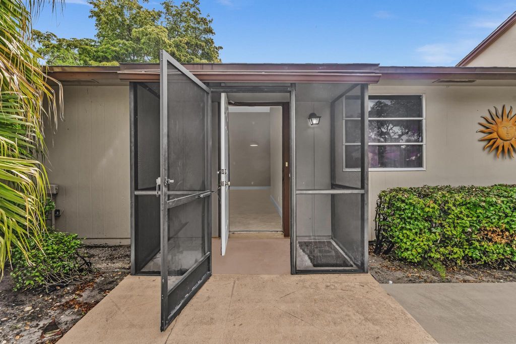 Photo of 11609 Orange Blossom Lane, Boca Raton, FL 33428 (MLS # B26013675)