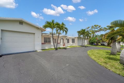 Photo of 555 NW 50TH Place, Boca Raton, FL 33431 (MLS # B26054603)