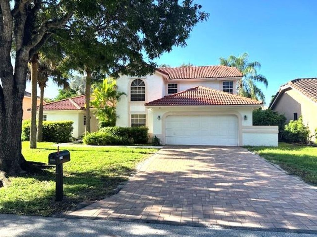 Photo of 5174 NW 51st Ct, Coconut Creek, FL 33073 (MLS # F10521449)
