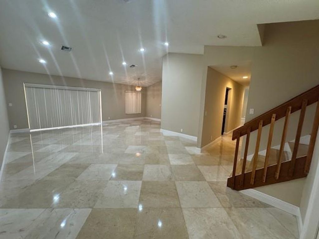 Photo of 5174 NW 51st Ct, Coconut Creek, FL 33073 (MLS # F10521449)