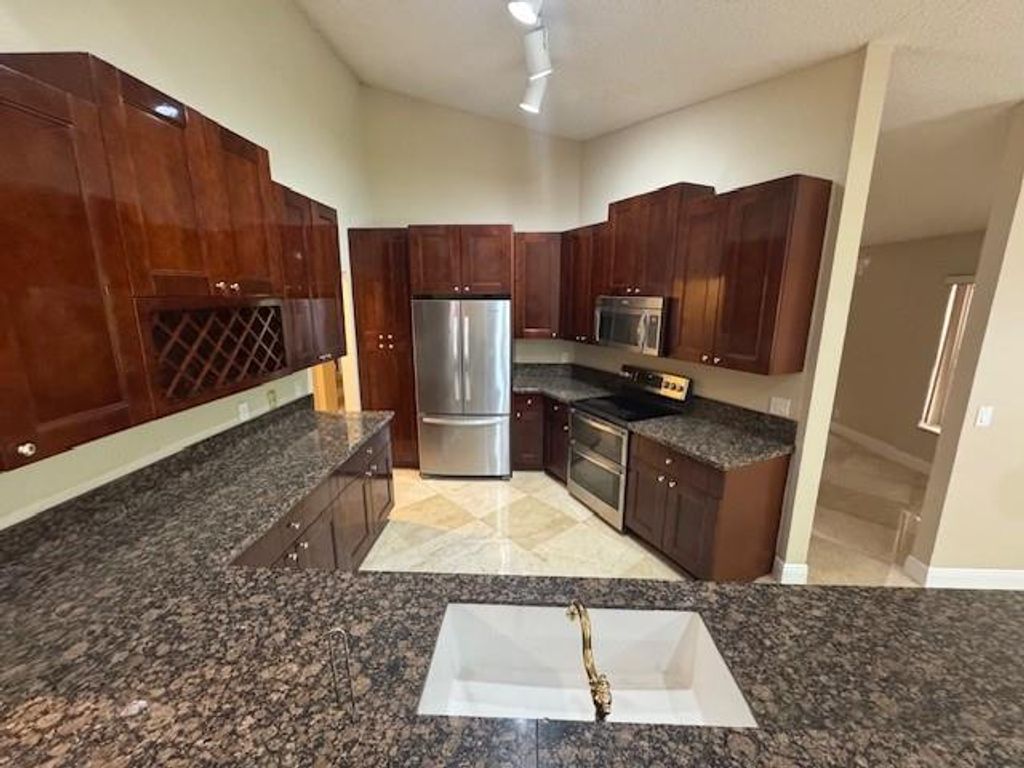 Photo of 5174 NW 51st Ct, Coconut Creek, FL 33073 (MLS # F10521449)
