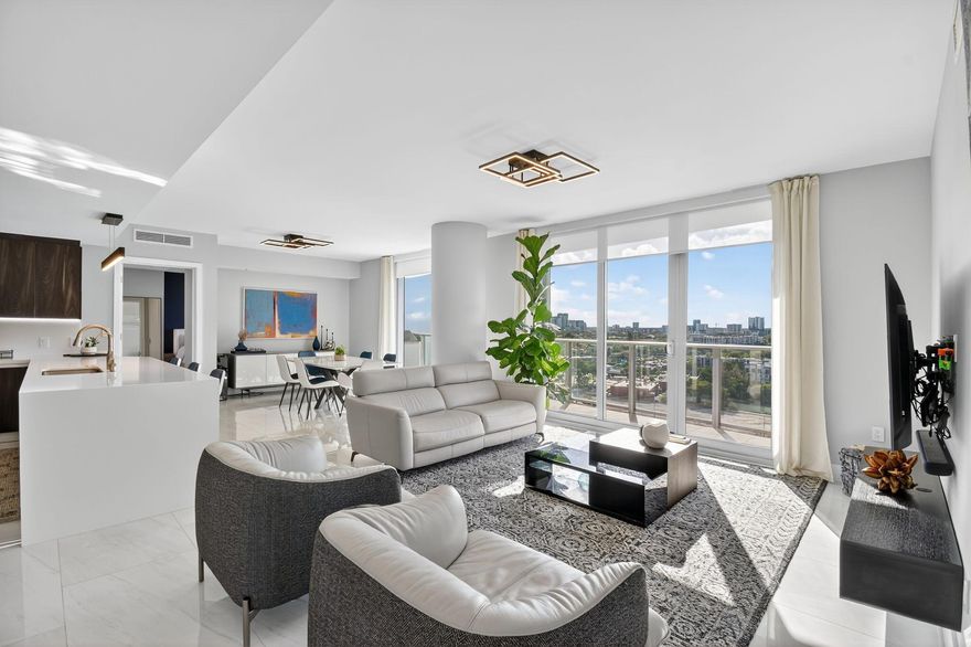 Contemporary waterfront residence on the Middle River with unobstructed sunset and skyline views. This 2BD/2BA open-concept residence features floor-to-ceiling glass, Italian cabinetry, Sub-Zero Refrigerator, Wolf Gas Cooktop, porcelain tile flooring throughout, day and evening electronic shades, and a spa-inspired primary bath with frameless glass and LED backlit mirrors.  Enjoy a 55' balcony with summer kitchen and gas grill. Amenities include a riverside pool, impressive fitness center, spa with sauna and steam, sunset deck, resident lounge, guest suites, 24/7 front desk attendant, valet, 2 dog walking areas and strong building reserves. Includes 2 parking spaces and storage. Boat slips may be available. Prime location 1 mile to the beach, close to Las Olas and FLL Airport.