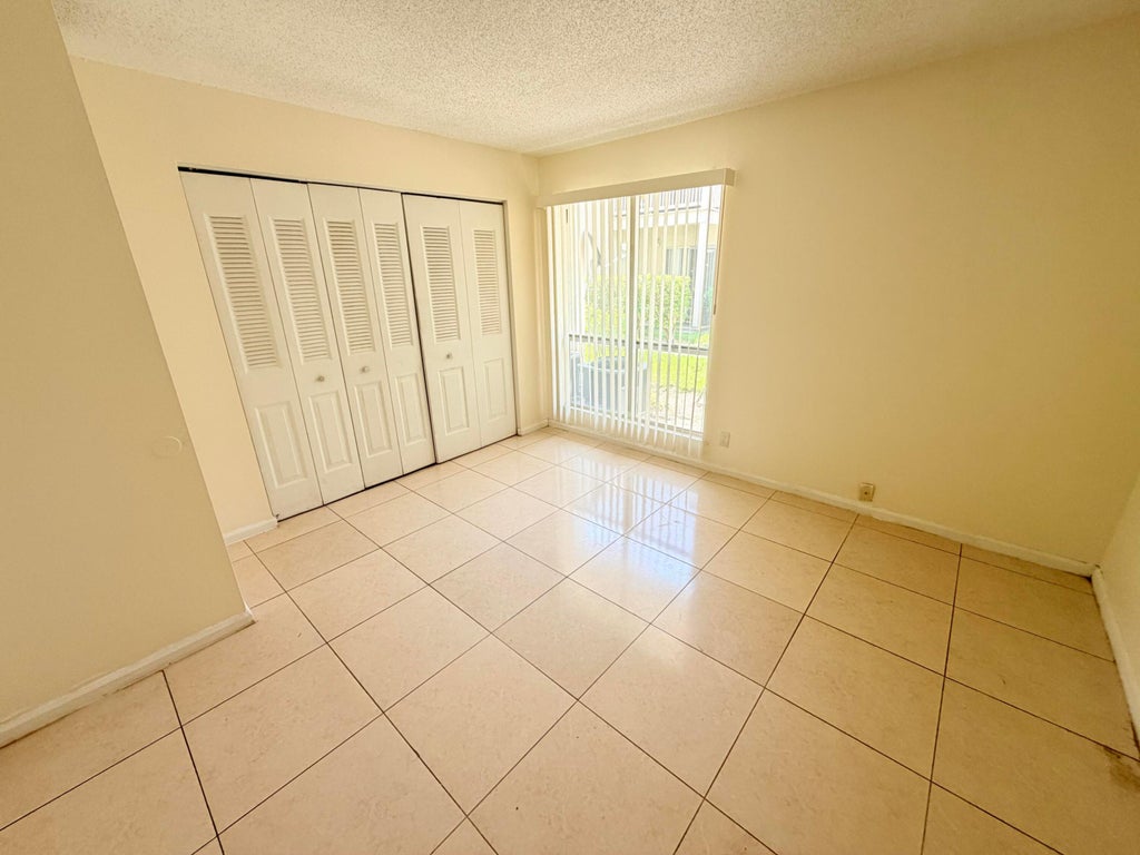 Photo of 1500 N CONGRESS Avenue #A113, West Palm Beach, FL 33401 (MLS # B26068399)