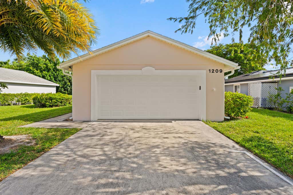 Photo of 1209 Pine Sage Circle, West Palm Beach, FL 33409 (MLS # B26062862)