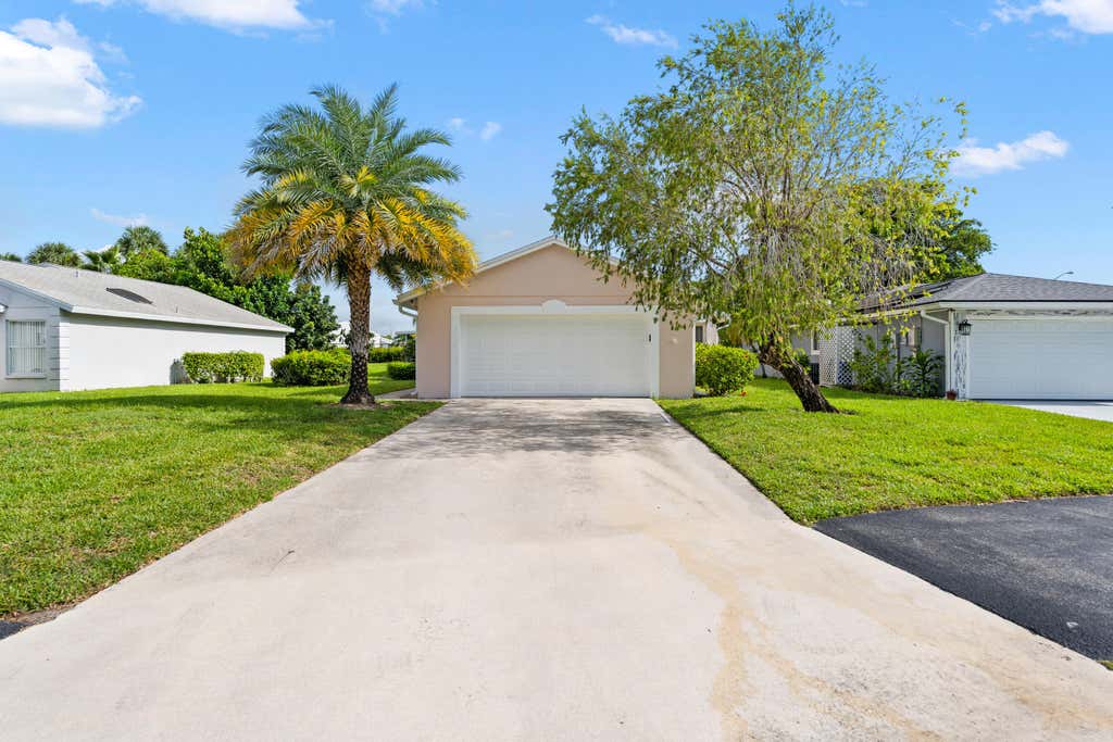 Photo of 1209 Pine Sage Circle, West Palm Beach, FL 33409 (MLS # B26062862)