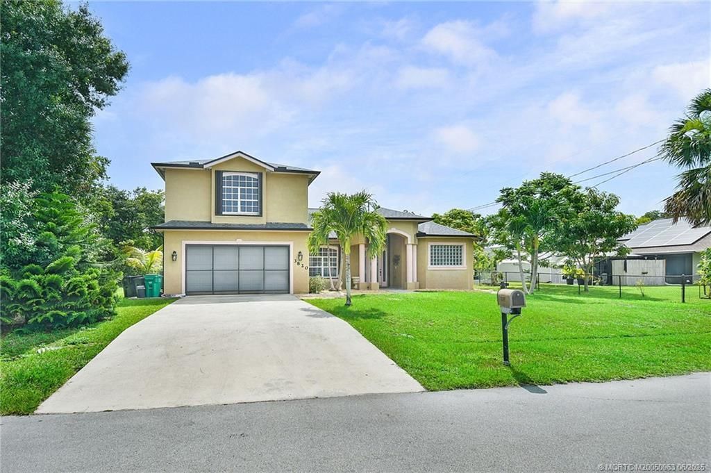 Photo of 3820 SW Cheribon Street, Port Saint Lucie, FL 34953 (MLS # R11099002)