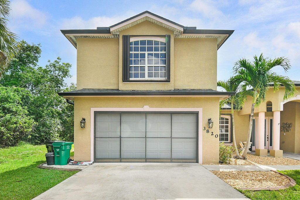 Photo of 3820 SW Cheribon Street, Port Saint Lucie, FL 34953 (MLS # R11099002)