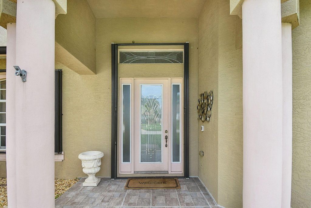 Photo of 3820 SW Cheribon Street, Port Saint Lucie, FL 34953 (MLS # R11099002)