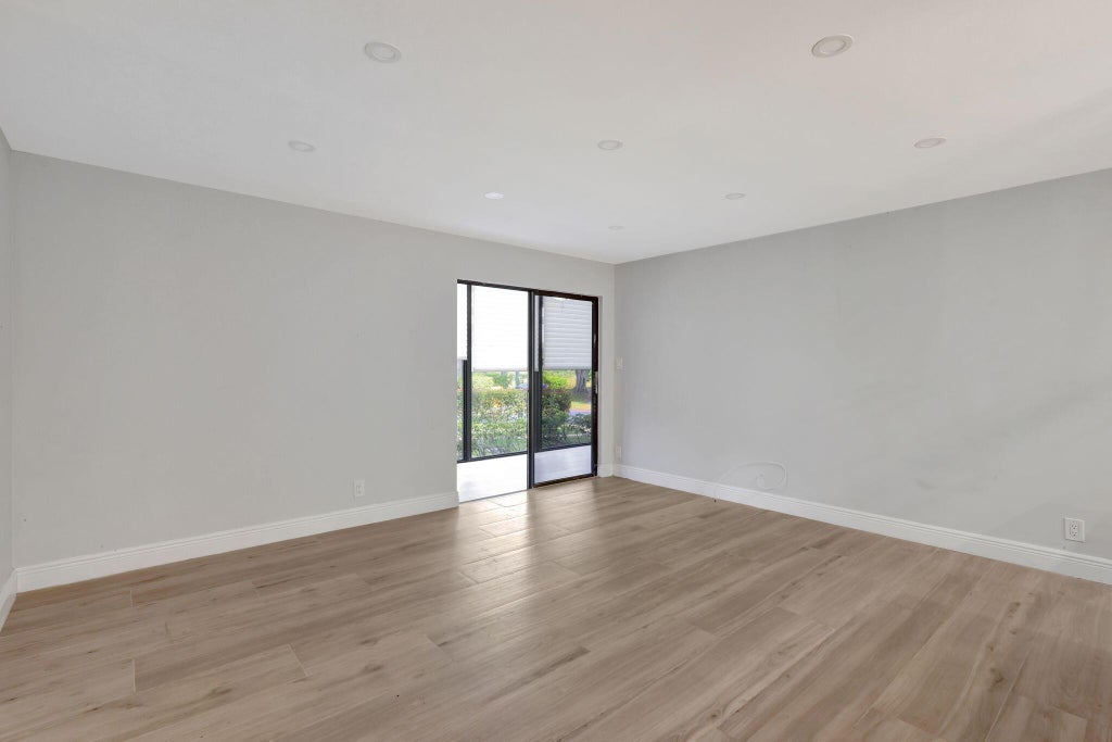 Photo of 15492 Lakes Of Delray Boulevard #101, Delray Beach, FL 33484 (MLS # R11036452)