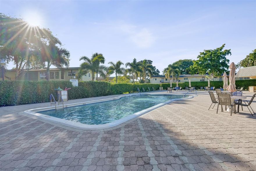 Stop Everything! And Come See The Best Priced 1st Floor 2bed 2 bath In All Of OGIII! She's Move In Ready & Waiting For You! East/West Exposure Delivers Beautiful Breezes & Abundant Natural Light. Newer Kitchen & Split Floorplan HasTile Throughout, Full Impact Windows For Storm Protection, Noise Reduction & Insurance Credits. A/C Is Less Than 1 Year Old Plus An Updated Electrical Panel For Truly Worry Free Living. Enjoy Peaceful Privacy With No Rear Neighbors! Assoc Dues Include Cable, Water, Pest Control, Trash, Clubhouse w/ Full Kitchen, Workout Rm, Pool Table, Library & If That Isn't Enough, Enjoy Monthly Social Events, Parties At The Pool & Tiki. Assoc Req: 700 Credit, $40k POI, 20% Down,  6 Mo Of Dues Held In Escrow (Refunded After 18 Months). 55 Plus To Reside. No Renting Or Leasing.