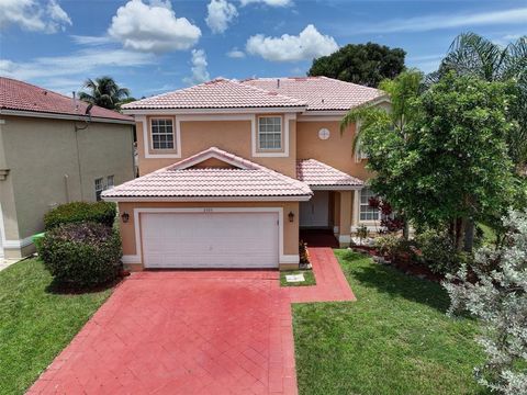 Photo of 2355 NW 138th Drive, Sunrise, FL 33323 (MLS # F10541468)