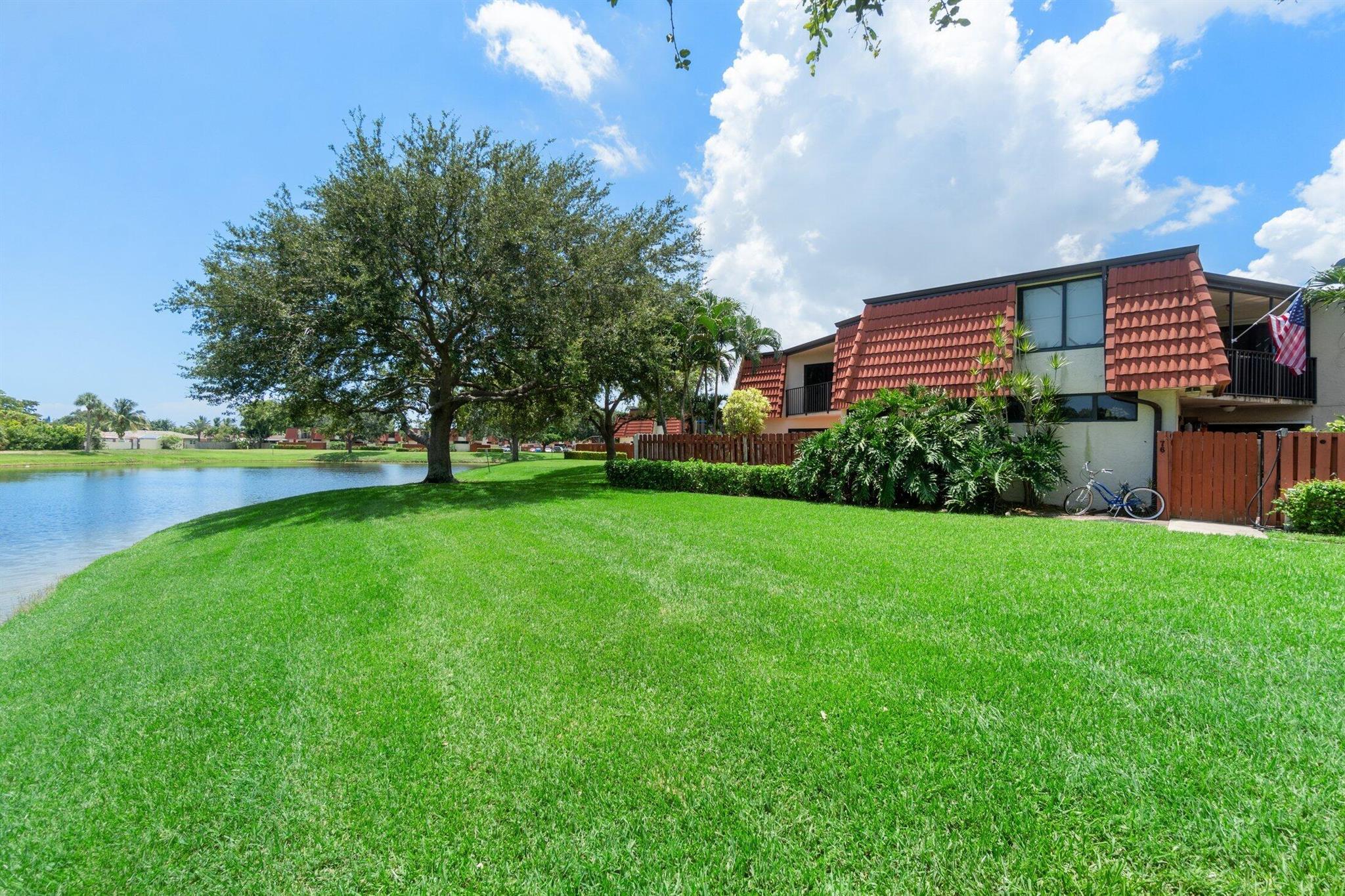 Discover your next home in the sought-after Somerset community, where tranquility meets modern elegance in this stunning two-bedroom, two and 1/2 -bathroom townhouse. This well-maintained residence offers 1,218 square feet of thoughtfully designed living space that perfectly balances comfort and style.The heart of this home showcases a newly remodeled kitchen featuring an open concept design that flows seamlessly throughout the main level. An impressive 8.5-foot eat-in kitchen bar creates the perfect gathering spot, complemented by custom cabinets, luxurious quartz countertops, and a complete set of matching stainless steel appliances. Every detail has been carefully considered, from the new fixtures to the freshly painted interior adorned with custom wood accents and elegant