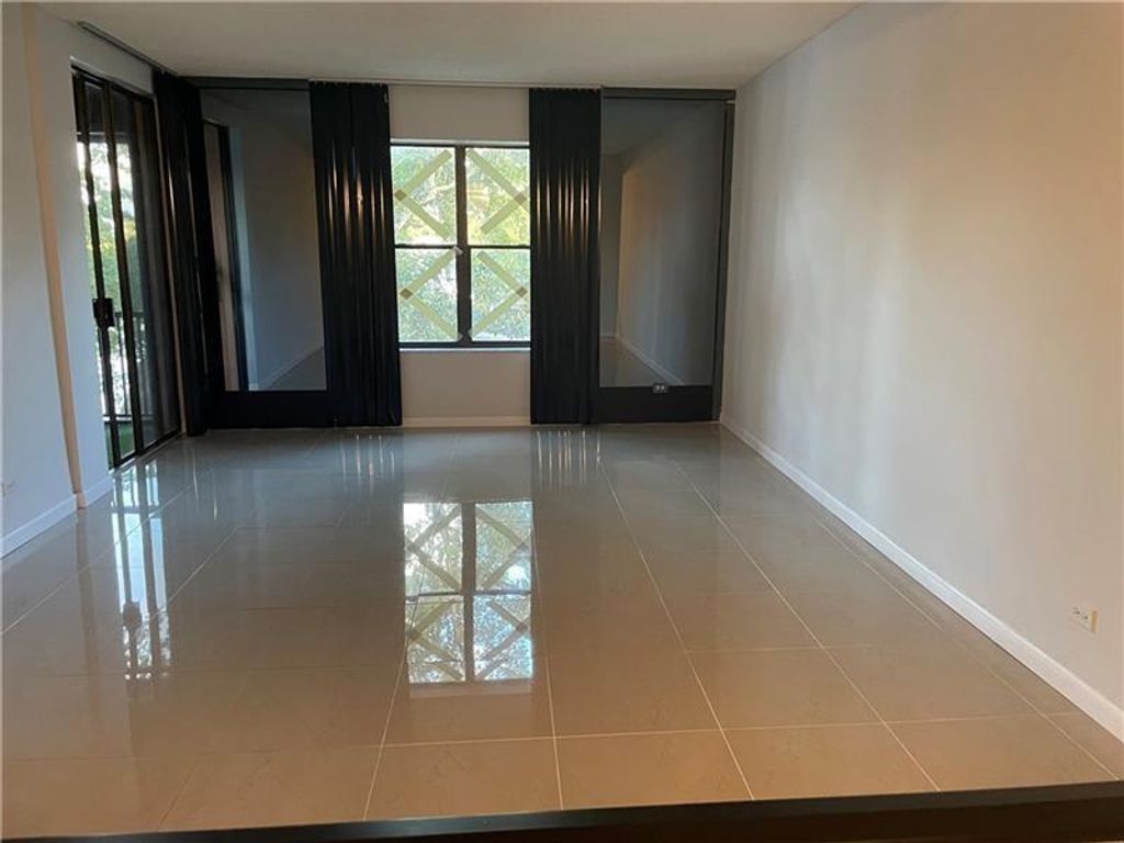 Photo of 3730 Inverrary Dr #3L, Lauderhill, FL 33319 (MLS # F10377702)