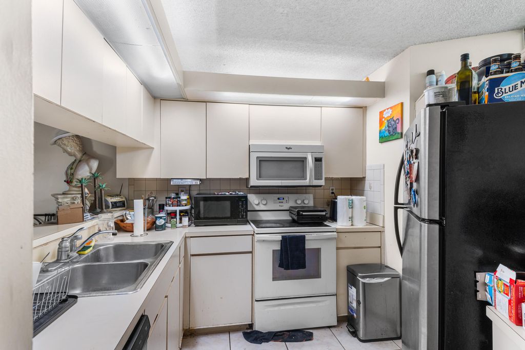 Photo of 3856 Victoria Drive, West Palm Beach, FL 33406 (MLS # B26027903)