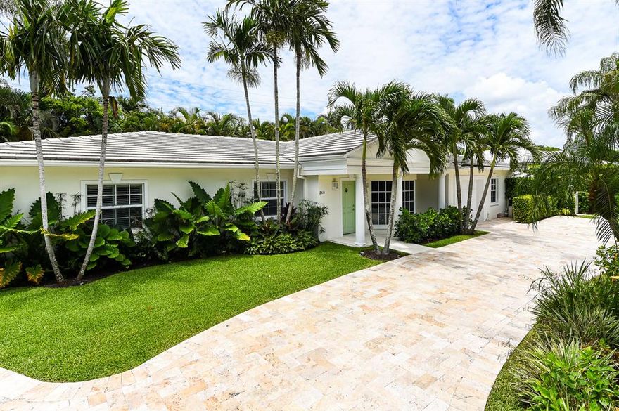Elegantly casual one-story Regency Style house, featuring an open floor plan and lovely entertaining rooms with attractive pool and garden areas. Spacious master bedroom suite. Many upgrades and details. Desirable location with easy access to the beach.