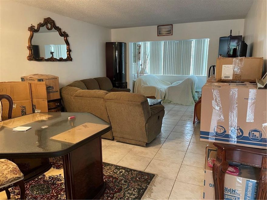 Well kept 2nd floor corner unit with lots of potential.  Located in a 55+ community containing 2 bedrooms and 2 bathrooms.  Elevator in building.  Amenities to enjoy such as tennis courts, clubhouse and pool, gym facility to name a few.   Close by shopping and Restaurants.  The Association requires a 650 minimum credit score.