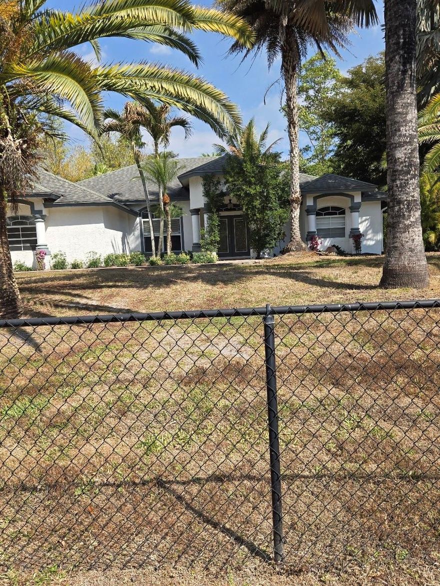 Check out this completely fenced 1.14 acre pool home in a great area of Loxahatchee, Fl.  Built in 2003 this home has been completely remodeled and full of upgrades.  Open kitchen has new stainless steel appliances, granite countertops, fresh paint throughout, tile floors and ready to move into.  Quiet neighborhood of fine homes.