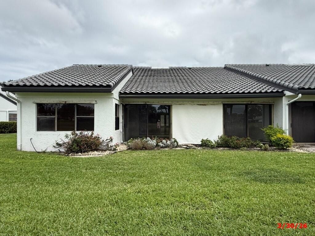 Photo of 9 Windsor Lane, Boynton Beach, FL 33436 (MLS # B26010096)