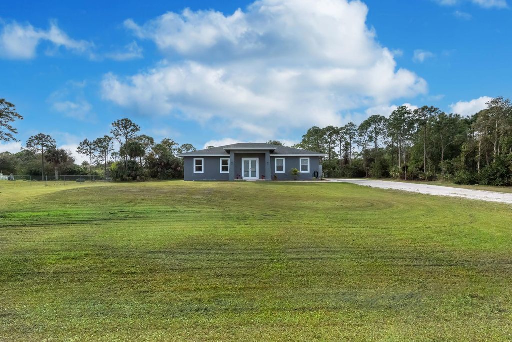 Photo of 15364 74th Street N, The Acreage, FL 33470 (MLS # R10954169)