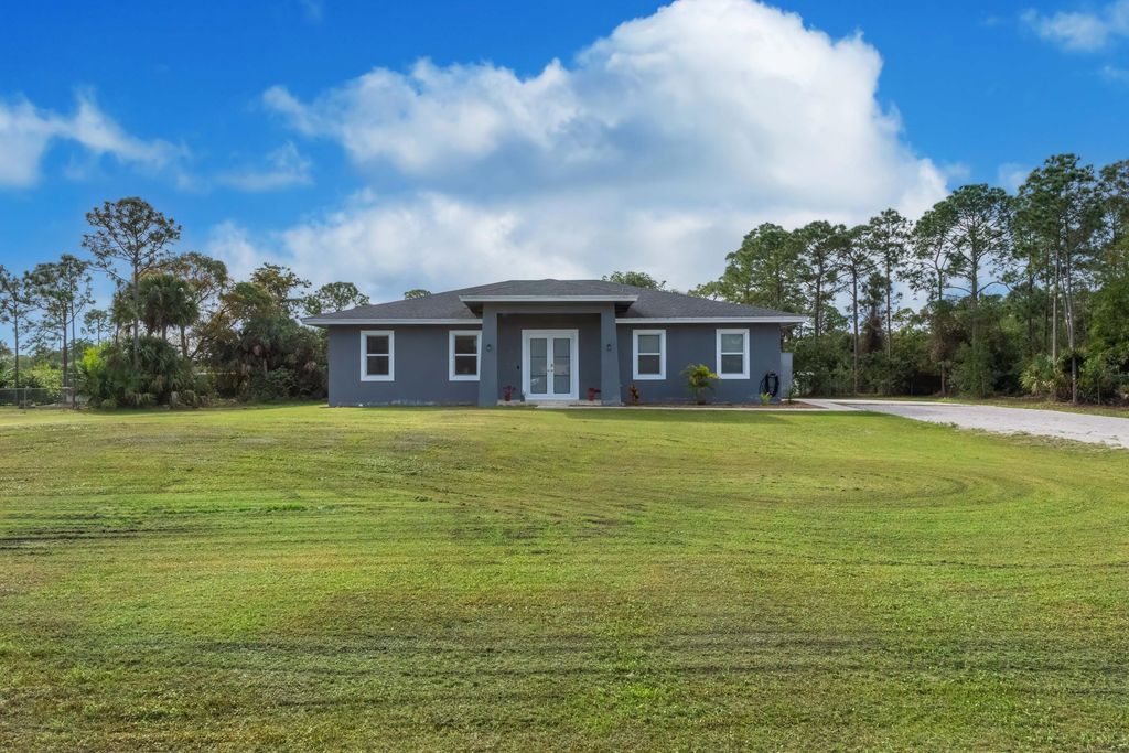 Photo of 15364 74th Street N, The Acreage, FL 33470 (MLS # R10954169)