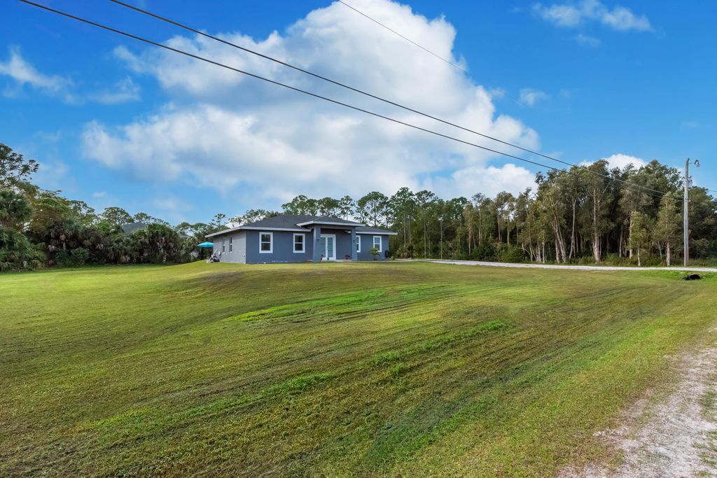 Photo of 15364 74th Street N, The Acreage, FL 33470 (MLS # R10954169)