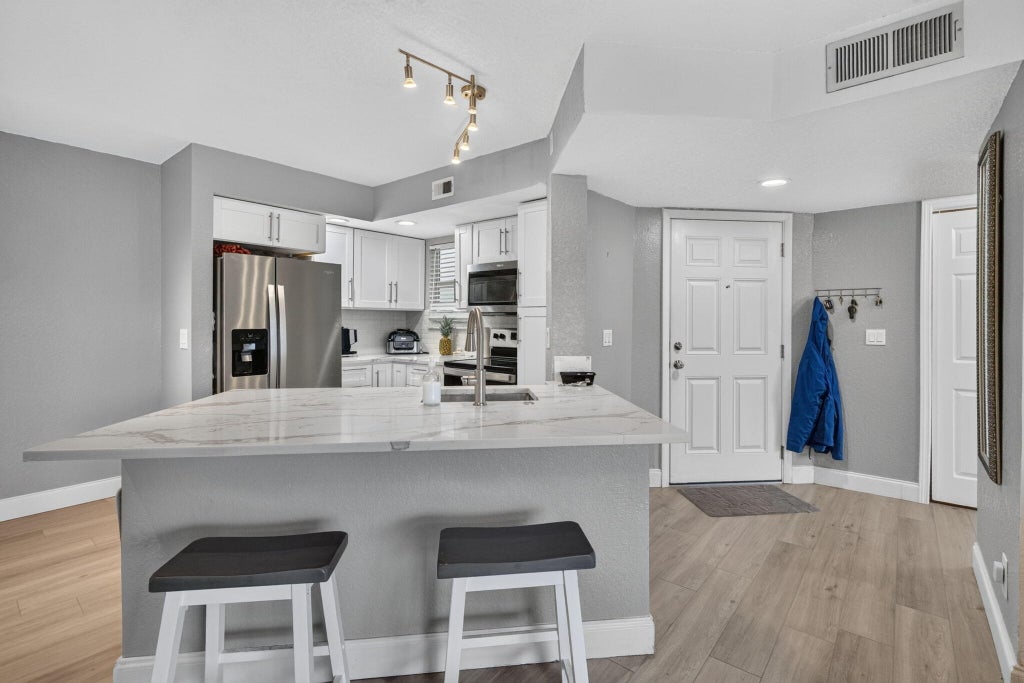 Photo of 12510 Vista Isles Drive #1212, Sunrise, FL 33325 (MLS # B26085298)