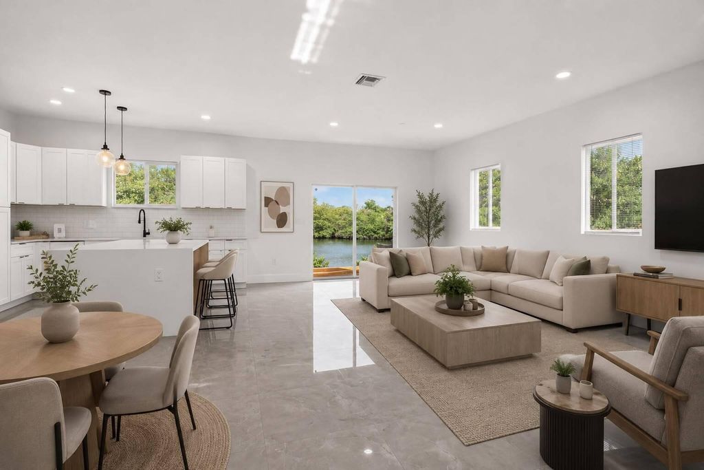 Photo of 655 NW 24TH Avenue, Fort Lauderdale, FL 33311 (MLS # B26052163)