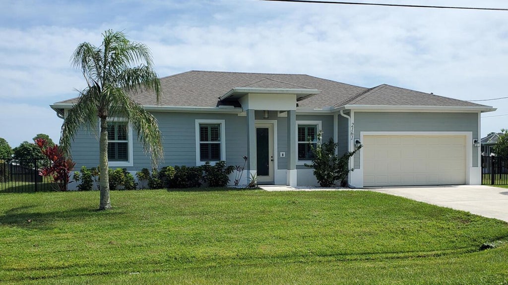 Photo of 2161 SE Sunflower Street, Port Saint Lucie, FL 34952 (MLS # B26076618)
