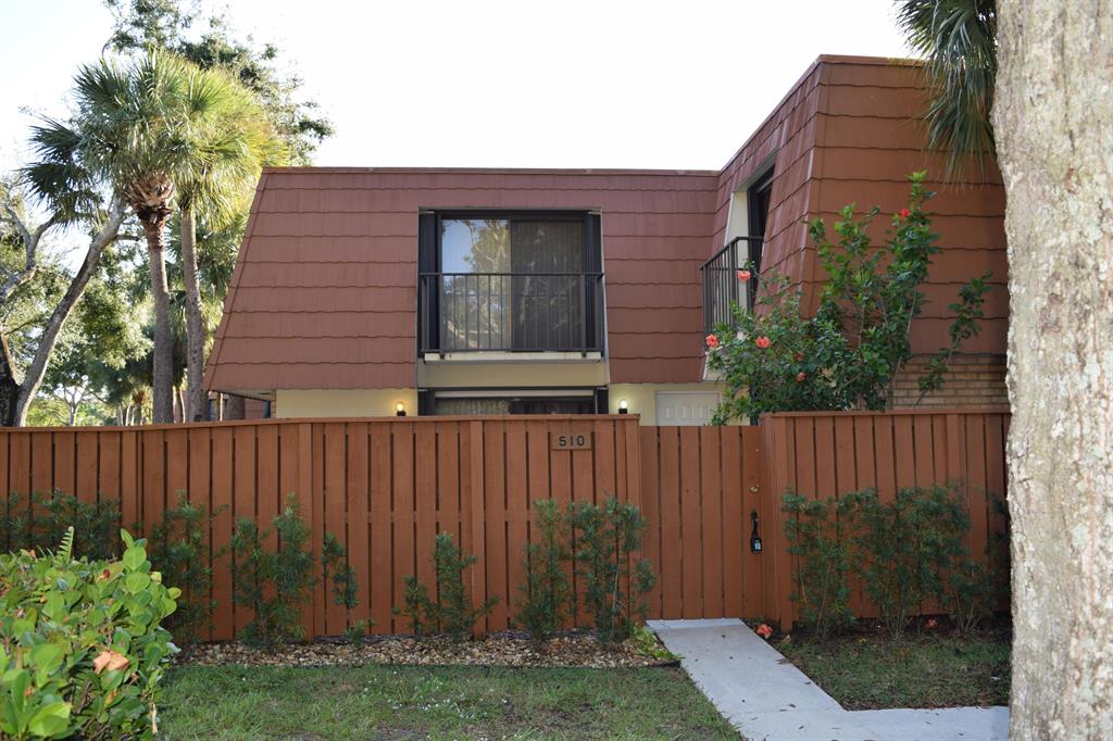 HIGHLY SOUGHT AFTER SANDALWOOD TOWNHOUSE FEATURING LARGE LIVING ROOM WITH DOOR WALL TO SPACIOUS FENCED IN PATIO TO ENJOY COOL EVENINGS OUTDOORS. KITCHEN HAS NUMEROUS CABINETS AND SEPARATE EATING AREA. MAIN LIVING AREA ALSO HAS HALF BATH & LAUNDRY. STORAGE UNDER STARS. MASTER BEDROOM FEATURES, WALK IN SHOWER, DUAL SINKS, WALK IN CLOSET AND BALCONY. SECOND BEDROOM FEATURES LARGE CLOSET, FULL BATH WITH AND SMALL BALCONY. ENJOY THE SERENE PARK LIKE SETTING. COMMUNITY FEATURES LARGE POOL, TENNIS COURTS, BASKET BALL COURTS & TOT LOT. CLOSE TO 95 & BEACH. BASIC CABLE INCLUDED