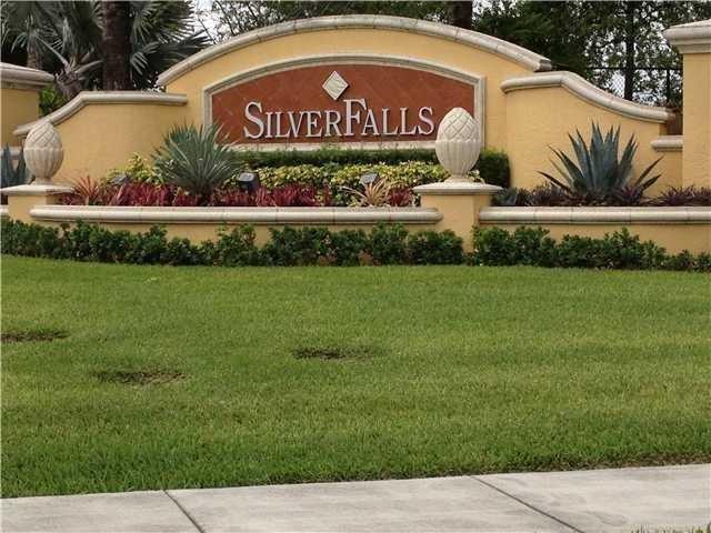 SPACIOUS 3/2.5 TOWNHOUSE PLUS DEN/OFFICE IN GATED COMMUNITY OF SILVER FALLS. LARGEST MODEL. CENTRAL LOCATION CLOSE TO I-75 AND MIAMI. HUGE MASTER BEDROOM AND WALK-IN CLOSET. MASTER BATH WITH SEPARATE TUB AND SHOWER. TILE FLOOR ON FIRST FLOOR AND CARPET ON SECOND FLOOR. FULL SIZE WASHER AND DRYER ON SECOND FLOOR.1 CAR GARAGE PLUS 2 ASSIGNED PARKING SPACES. GREAT AMENITIES: CLUBHOUSE, POOL, TENNIS COURTS, BASKETBALL COURTS, CHILD PLAY AREA, AND GYM. AVAILABLE IMMEDIATELY. VERY NICE COMMUNITY. SUBMIT LAST 2 PAYSTUBS, CREDIT REPORT, CTL, DRIVER LIC.1ST, LAST, SECURITY. BRAND NEW LAMINATE FLOOR, APPLIANCES, COUNTERTOPS. RENT INCLUDES: INTERNET, WATER/SEWER AND WASTE. AT THE GATE ASK FOR ARIS CRUZ. VACANT. 620 min credit score. Maximum 2-3 cars.