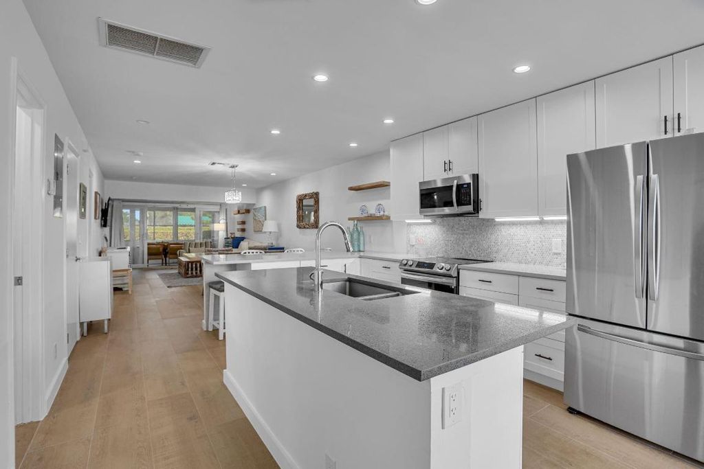 Photo of 2331 Croton Lane #101-C, Delray Beach, FL 33445 (MLS # R11142346)