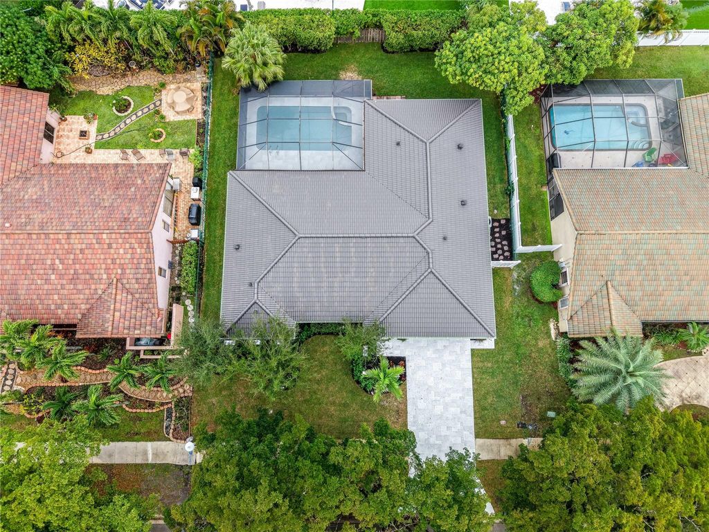 Photo of 6411 NW 54th Dr, Coral Springs, FL 33067 (MLS # F10541058)