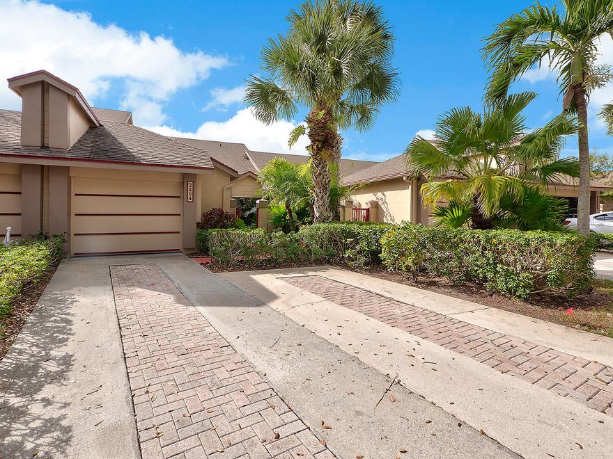 This three bedroom 2.5 bath courtyard townhouse is perfect for the people who want to get the most out of Florida's sunny weather.  With a large 27' by 12' newly rebuilt deck overlooking a lagoon and an attached screened in patio you can be as comfortable outside as you are inside. There are three sets of sliding glass doors. The unit is located a stone's throw from the Landing's community swimming pool. It's truly like living in a resort! The master bedroom is on main level and the other bedrooms are up. The master bath has a walk-in shower.  A bathtub is in the upstairs bath.  All appliances new in the past two years. Parking your car is easy. The one car garage is extra wide and there is driveway parking for three cars.
