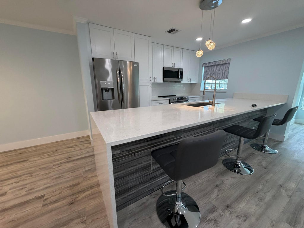 Photo of 14516 Canalview Drive #B, Delray Beach, FL 33484 (MLS # B26079918)