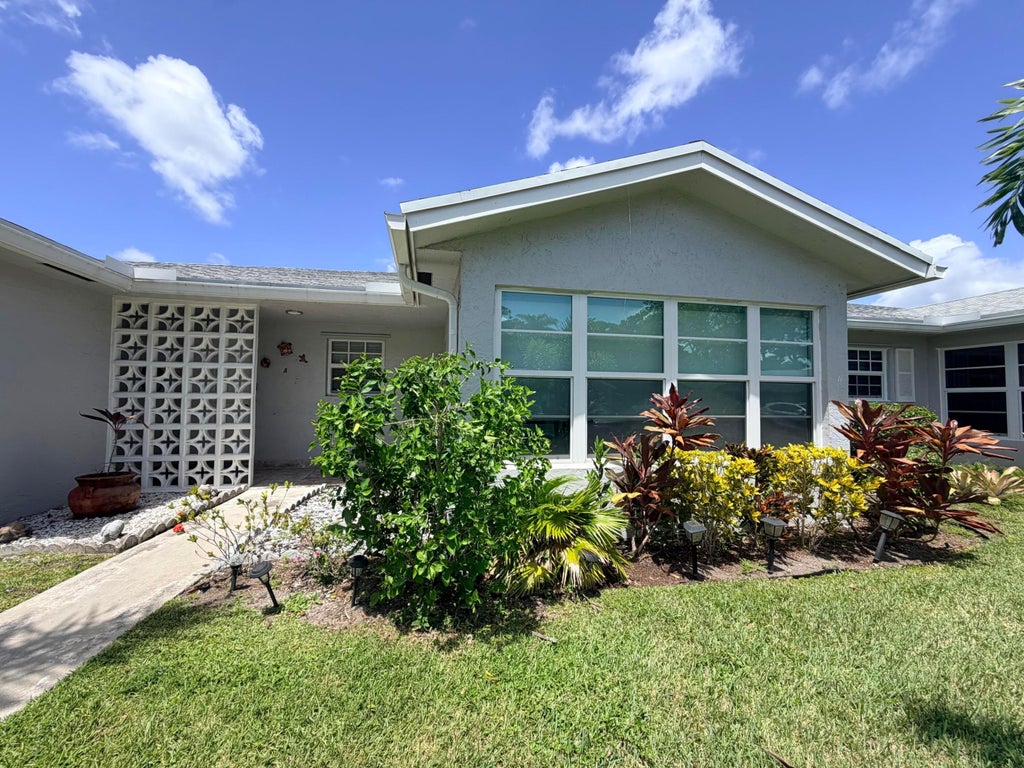 Photo of 14516 Canalview Drive #B, Delray Beach, FL 33484 (MLS # B26079918)