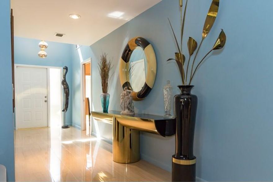 A MUST SEE..FABULOUS LIGHT BRIGHT 3 BEDROOM 2.5 BATH VILLA IN GATED COUNTRY CLUB COMMUNITY..KITCHEN AND BATHROOMS ARE BEAUTIFULLY RENOVATED..MARBLE FLOORS IN LIVING AREAS A/C THREE YEARS OLD, BEING SOLD PARTIALLY FURNISHED (SEE DOCUMENTS SECTION FOR ADDENDUM LISTING FURNISHINGS THAT DON'T CONVEY.) GREAT GOLF COURSE VIEWS FROM LANAI AND PATIO.  ONE CAR GARAGE WITH LONG DRIVEWAY AND EXTRA PARKING SPOT.  700 CREDIT SCORE AND MEMBERSHIP REQUIRED.