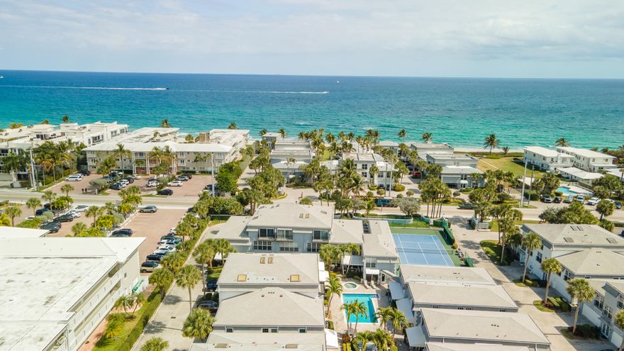 Beautiful tri level townhome on prestigious Hillsboro Mile!! 30 second walk to private beach!! Peek ocean view from kitchen and second bedroom. Very spacious unit with loads of storage, gorgeous granite kitchen, and full sized washer/dryer. Master has nice balocny overlooking pool area. One car garage. Lovely quiet community yet close to Deerfield and all the 'hot' spots! Don't miss it!!