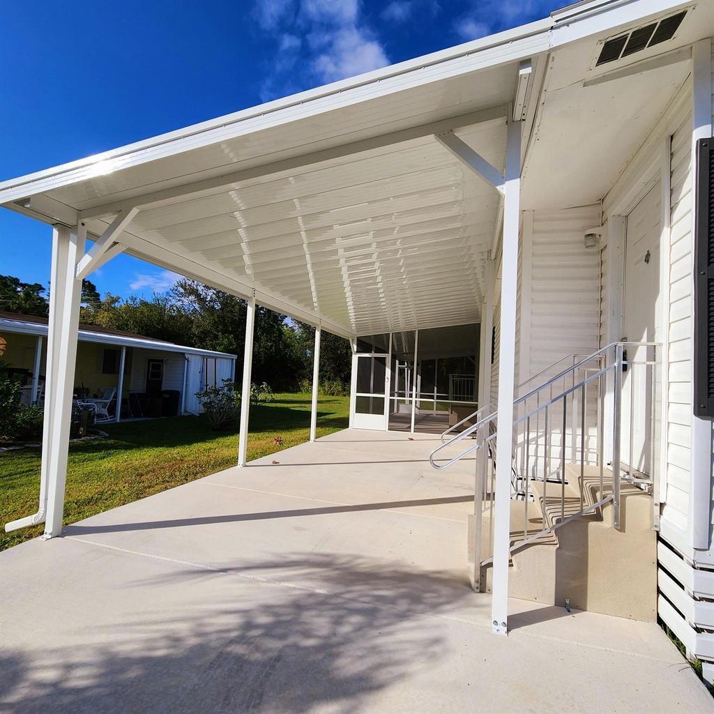 Photo of 188 W Caribbean, Port Saint Lucie, FL 34952 (MLS # R11032547)