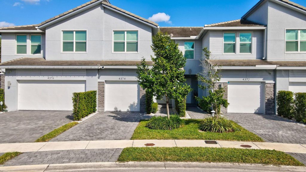 Photo of 4374 Veleiros Avenue, Deerfield Beach, FL 33064 (MLS # R11072190)
