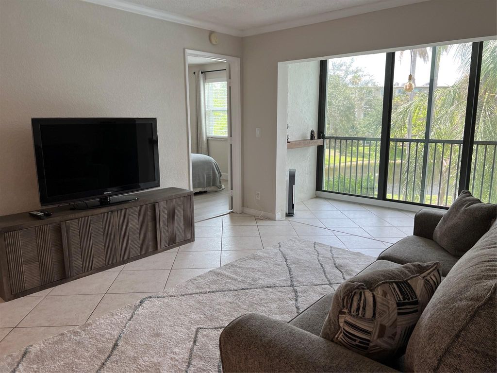 Photo of 2220 N Cypress Bend Drive #301, Pompano Beach, FL 33069 (MLS # F10443430)