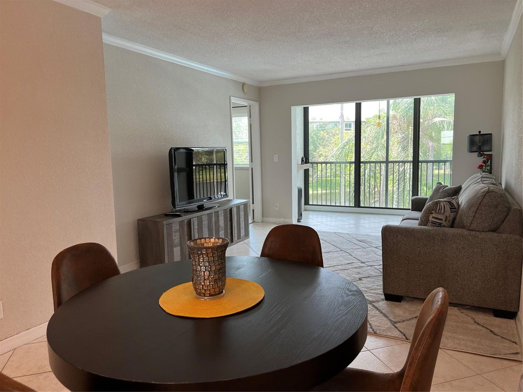 Photo of 2220 N Cypress Bend Drive #301, Pompano Beach, FL 33069 (MLS # F10443430)