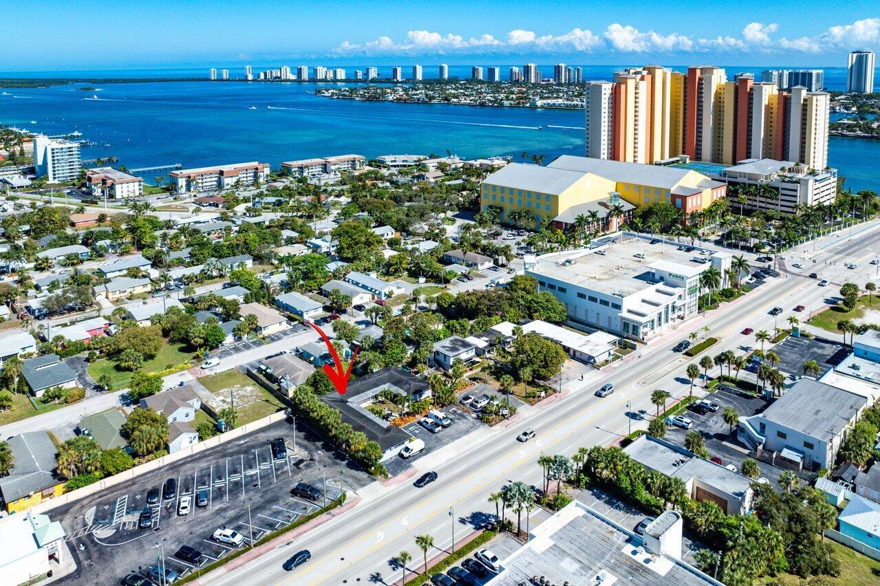 3 PARCELS INCLUDED IN THE SALE!! (see broker remarks for the parcel ids) The city of Riviera will allow for residential/ multi family, daycare, nursing home, hospital, professional office and more. This is a great opportunity to own almost an acre of land seconds away from Singer Island in a wonderful developmental area.Bring all offers.