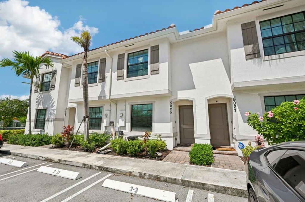 Photo of 5025 Genove Place, Riviera Beach, FL 33410 (MLS # R11123260)