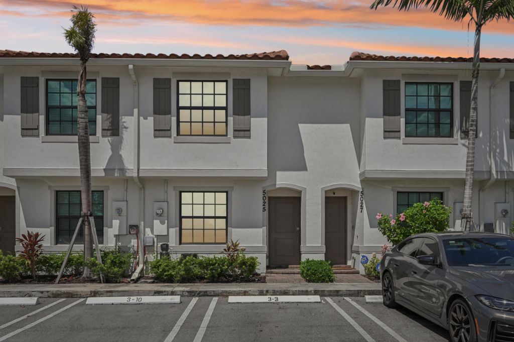 Photo of 5025 Genove Place, Riviera Beach, FL 33410 (MLS # R11123260)