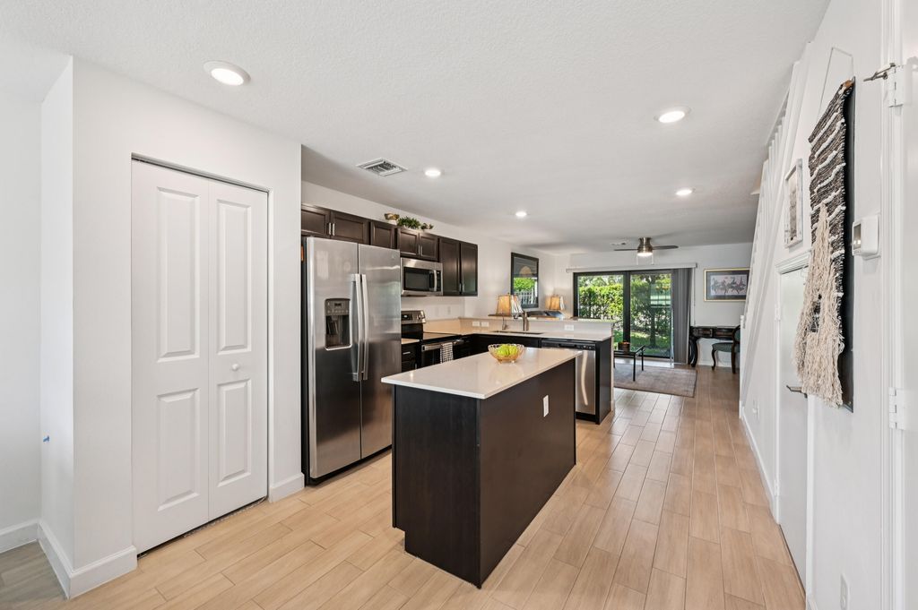 Photo of 5025 Genove Place, Riviera Beach, FL 33410 (MLS # R11123260)