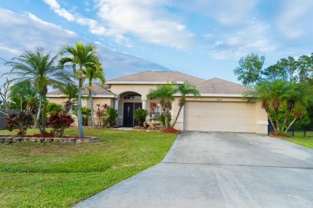 Photo of 6822 NW Granger Avenue Ave, Port St Lucie, FL 34983 (MLS # R10780106)